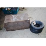 Three 3.50/8 tyres and tubes and a wooden military box.