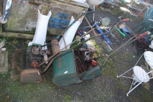 Two vintage cylinder mowers, (engines turn).