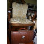 An upholstered Satinwood framed hall chair and a leather briefcase.