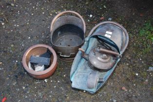 Copper items, planter and a coal scuttle.