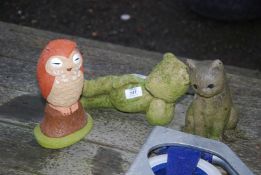 Bear, owl and cat garden ornaments.