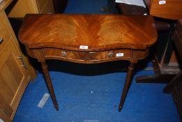 A small Mahogany side table with a frieze drawer, 31 1/2" x 13" x 28 1/2" high.