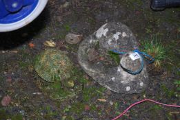 An Otter and Tortoise garden ornaments.