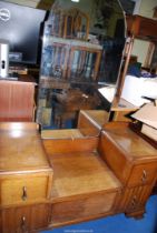 A 1940's style Oak finished dressing table, 41" x 18" x 5' high.