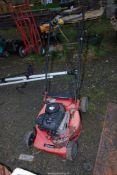 A Sovereign four stroke mower.