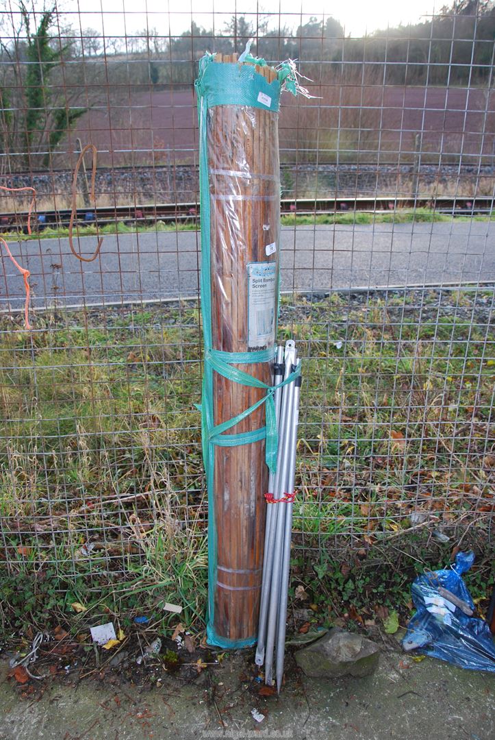 Split bamboo fencing and some bars.