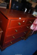 A red-stained chest of two over three drawers, 42" x 17 1/2" x 41 1/2" high.