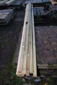 Ten lengths of tanalised timber, 2'' square x 169'' long.