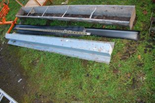 A quantity of metal lintels with Dexion angle, 100" long and 71" long.