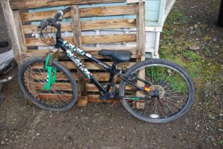 An Apollo 18 speed child's mountain bike.