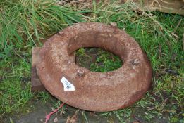 A tractor wheel centre weight.