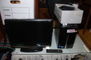 A Packard Bell Intel Core 2 Quad P.C. tower, routers and a Logik TV - DVD a/f., 17", with remote.