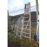 Two wooden step ladders.