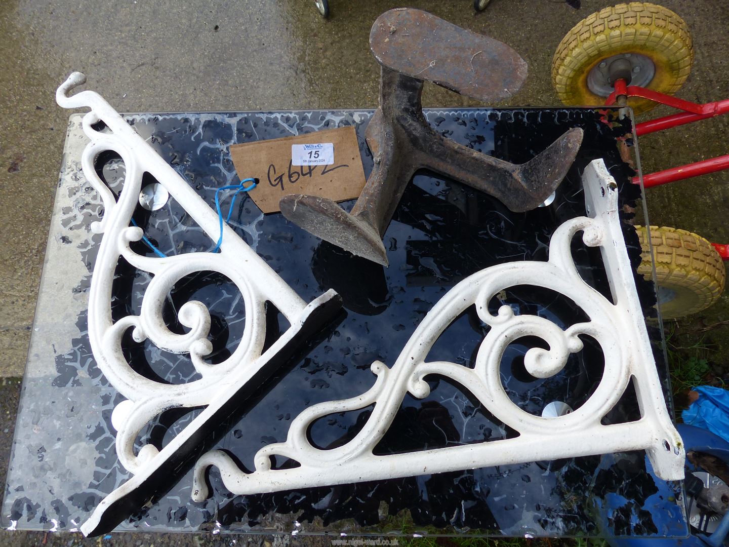 Two aluminium wall brackets and a cobbler's shoe last. - Image 2 of 2