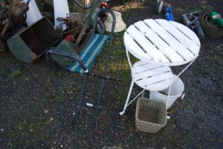 A small round table, china pail, etc.