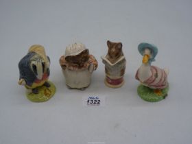 Four Royal Albert Beatrix Potter figures; Tommy Brock, Tailor of Gloucester,