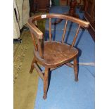 A vintage child's carver chair. 20 1/2'' high, 12'' high seat.
