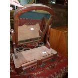 An Edwardian table top Mirror with lower drawers, on bun feet.