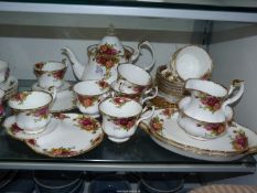 A six setting Royal Albert Old Country Roses tea set with two trios.