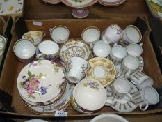 A quantity of part tea and coffee sets to include Aynsley, Susie Cooper and Ironstone Indian Tree,