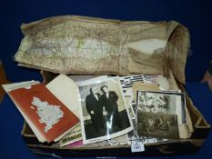 A box of ephemera and photographs.