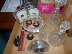 A quantity of glass to include; two decanters, a bell, stemmed fruit bowl, etc.