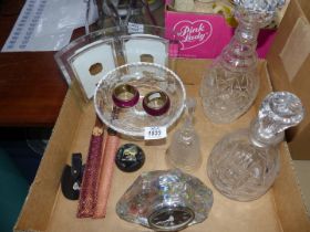 A quantity of glass to include; two decanters, a bell, stemmed fruit bowl, etc.
