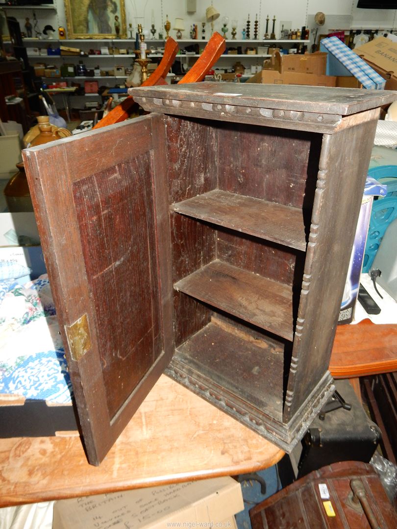 A carved doored dark Oak wall hanging Cupboarfd, 15'' wide x 8 3/8'' deep x 24 1/2'' high. - Image 2 of 3