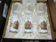 A boxed set of limited edition Silver Jubilee mugs.