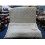 A Dorma king-size quilted bedspread in cream and white with lace style pattern plus a matching