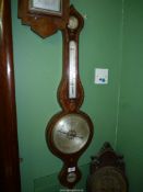 A Banjo Barometer with gilt scroll detail.