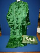 A Chinese green satin kimono and slippers set in matching box.