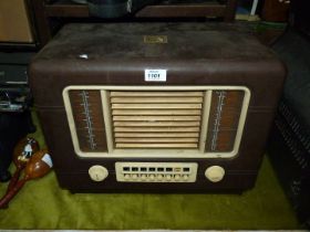 An 'His Master's Voice' Bakelite radio, 19" x 14 1/2" x 10 3/4".