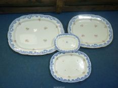 Four graduated meat plates in 'Dresden Trellis',