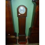 An Oak finished cased Grandmother Clock having later quartz movement, 53 1/4'' high.