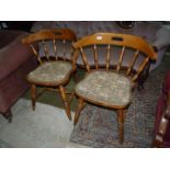 A pair of saloon type Chairs having turned legs,