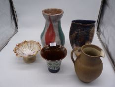 A small quantity of pottery to include a heavy handmade vase, vase with mushroom decoration,