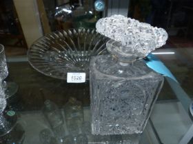 A fruit bowl in contemporary cut design and cut glass decanter having star cut pattern.