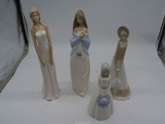 Four ladies figurines including Nao lady clutching a posy,
