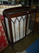 A 1940/50's bow fronted china Display Cabinet, 48'' wide x 15'' deep and 51'' high,