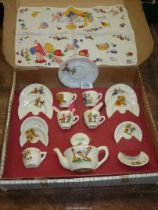 A boxed children's doll's Teaset with nursery rhyme details and Mabel Lucie Attwell handkerchief.