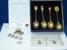 A boxed set of Queen Elizabeth Diamond Jubilee 22 carat gold plated teaspoons,