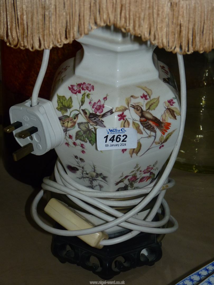 A pretty china lamp base in white ground with birds and floral pattern comes with floral fringed - Image 2 of 2