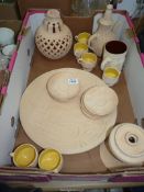 A quantity of clay pottery to include coffee set, mug, etc.