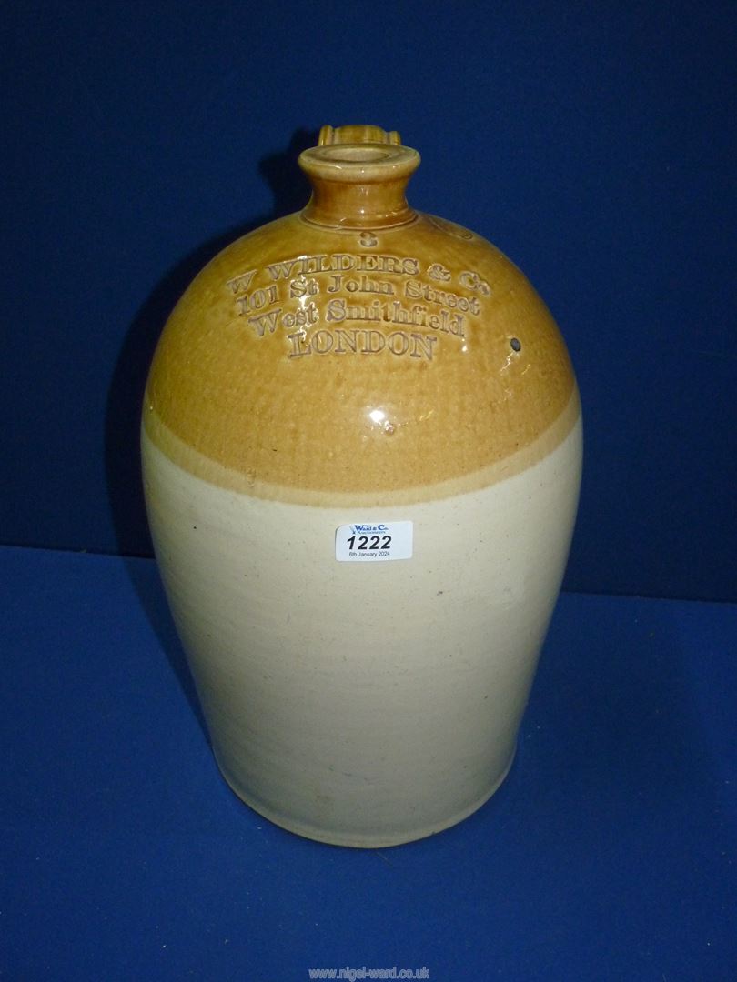 A stoneware flagon marked W. Wilder, London, 17'' tall.