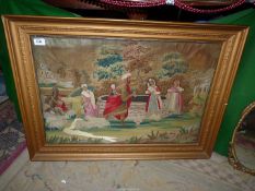 A framed colourful family Needlework 'Rebecca at the Well', worked in knot stitches, 33 1/2" x 24".
