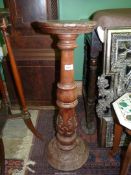 A plant stand with carved Acanthus leaf detail, 29 1/2" tall.