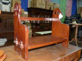 A Mahogany 19th century Gothic, Arts & Crafts large book trough with pierced ends,