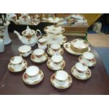 A Royal Albert 'Old Country Roses' tea service for eight with cake stand and some extras..