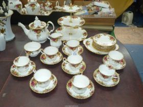 A Royal Albert 'Old Country Roses' tea service for eight with cake stand and some extras..